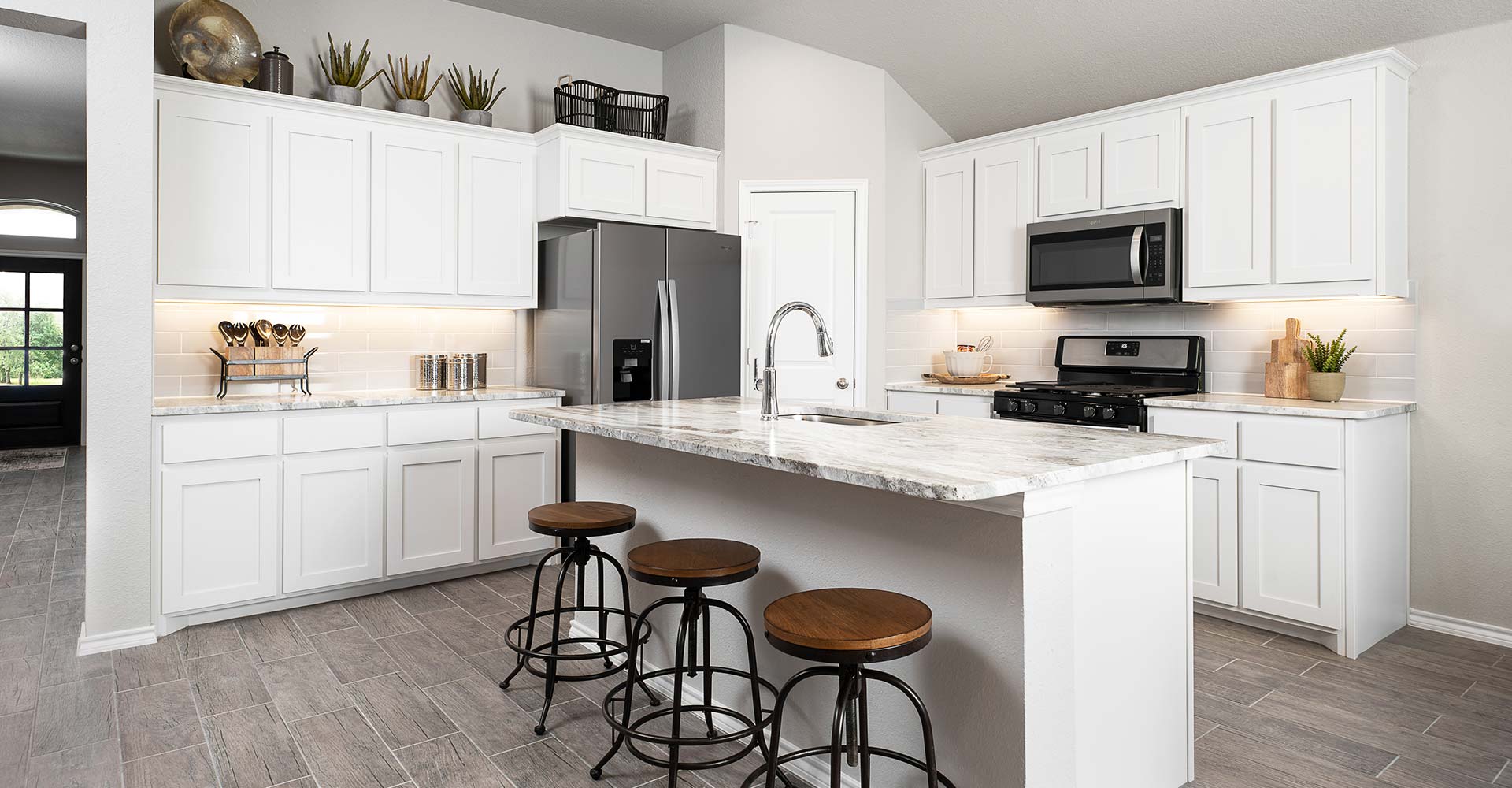 Cheyenne Floorplan Model Home Kitchen in Montclaire by Impression Homes
